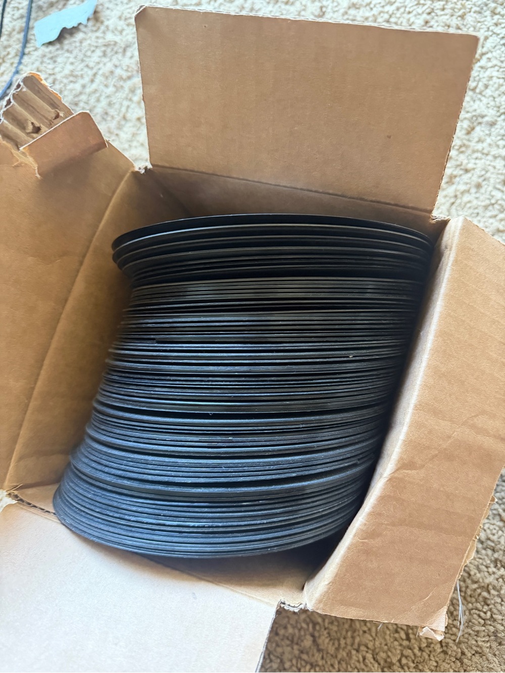 Stack of Black Vinyl 45 RPM records